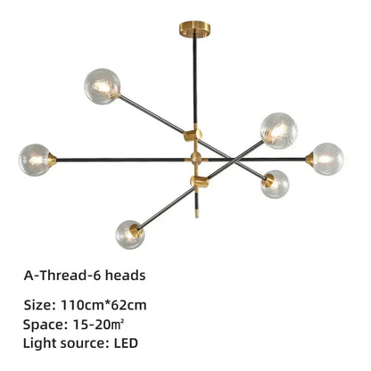 Modern brass and black geometric glass ball chandelier with six-arm black rods and clear glass globe bulbs for dining room decorbites geometric glass
