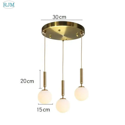 Modern brass and black glass ball led pendant light with gold-toned rods and frosted spheres for dining room decorbites glass ball