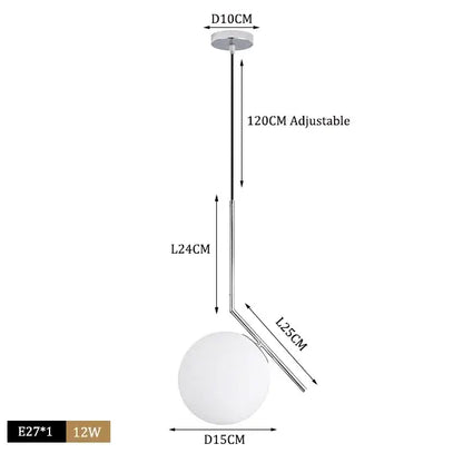 Modern brass and black glass ball pendant light featuring a frosted glass globe and chrome rod for dining room decorbites