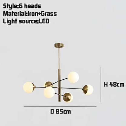 Modern brass and black glass bubble chandelier with six frosted glass light heads for dining room decorbites glass bubble lighting