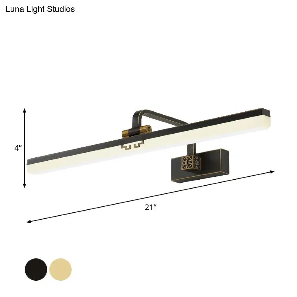 Modern brass and black led wall sconce with sleek rectangular design and warm color temperature for dressing table use