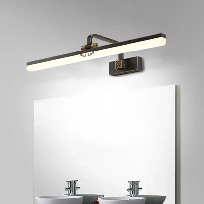 Modern brass and black led wall sconce with warm color temperature for dressing table vanity mirror lighting