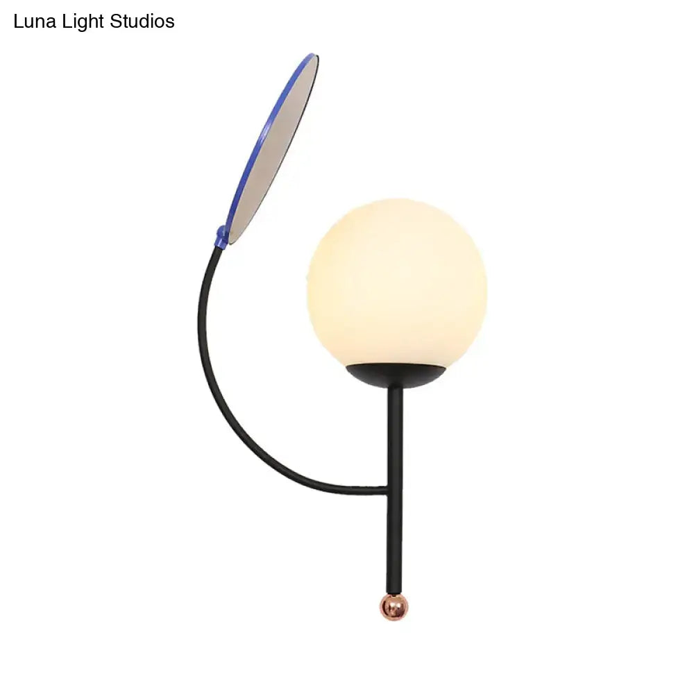 Modern black metal wall sconce with adjustable blue-edged led arm and white frosted glass spherical shade for reading light