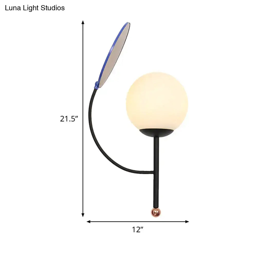 Modern black metal desk lamp with white frosted glass globe shade and adjustable blue led reading light for bedroom use