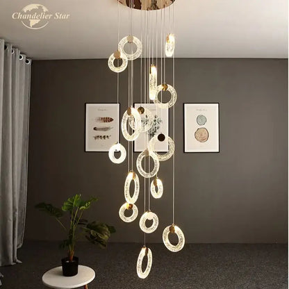 Modern brass bubble crystal led chandelier with gold-toned cascading rings and embedded led lights for bedroom decorbites bubble crystal