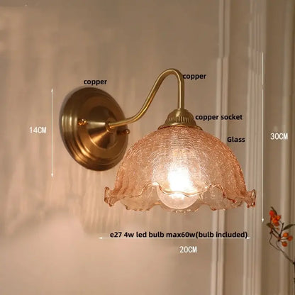 Modern brass butterfly wall sconce with antique brass finish and amber textured glass shade for bedroom decorbites clear glass
