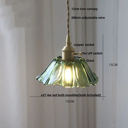 Modern brass clear glass led pendant light featuring a delicate green fluted decorbites clear glass design for dining room
