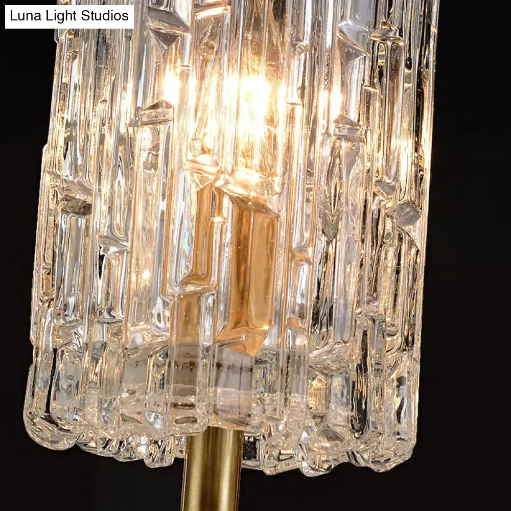 Modern brass clear glass sconce with faceted crystal and gold-toned metal base for living room 12 inch fixture