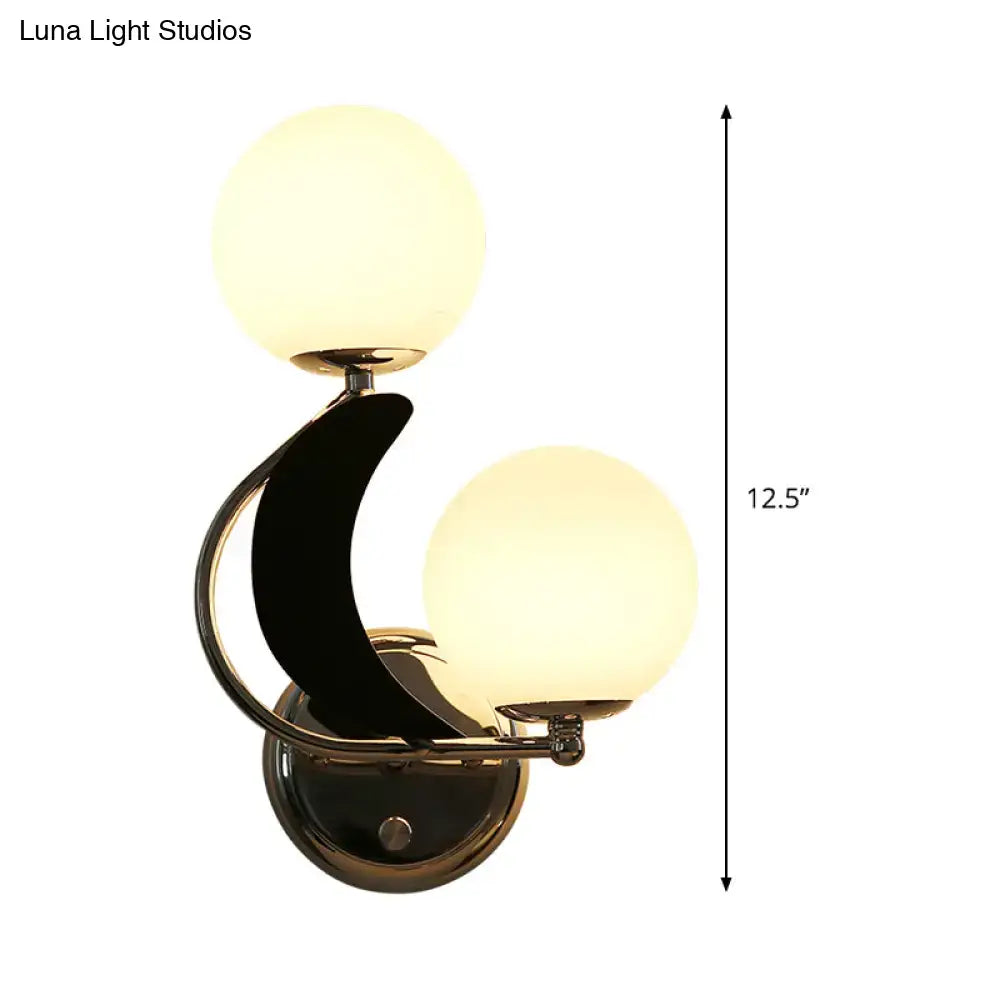 Modern brass crescent wall lighting featuring black and brass finish with two frosted glass shade globes 220v-240v 110v-120v