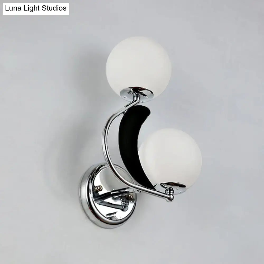 Modern brass crescent wall lighting with chrome finish, two frosted glass shade globes, and black crescent moon accent for 220v-240v 110v-120v use
