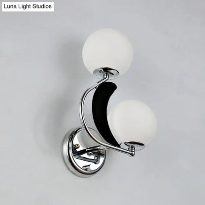 Modern brass crescent wall lighting with chrome finish, two frosted glass shade globes, and black crescent moon accent for 220v-240v 110v-120v use