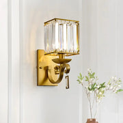 Gold-toned modern brass crystal block wall light with rectangular crystal cage vertical prisms e12 e14 inch fixture