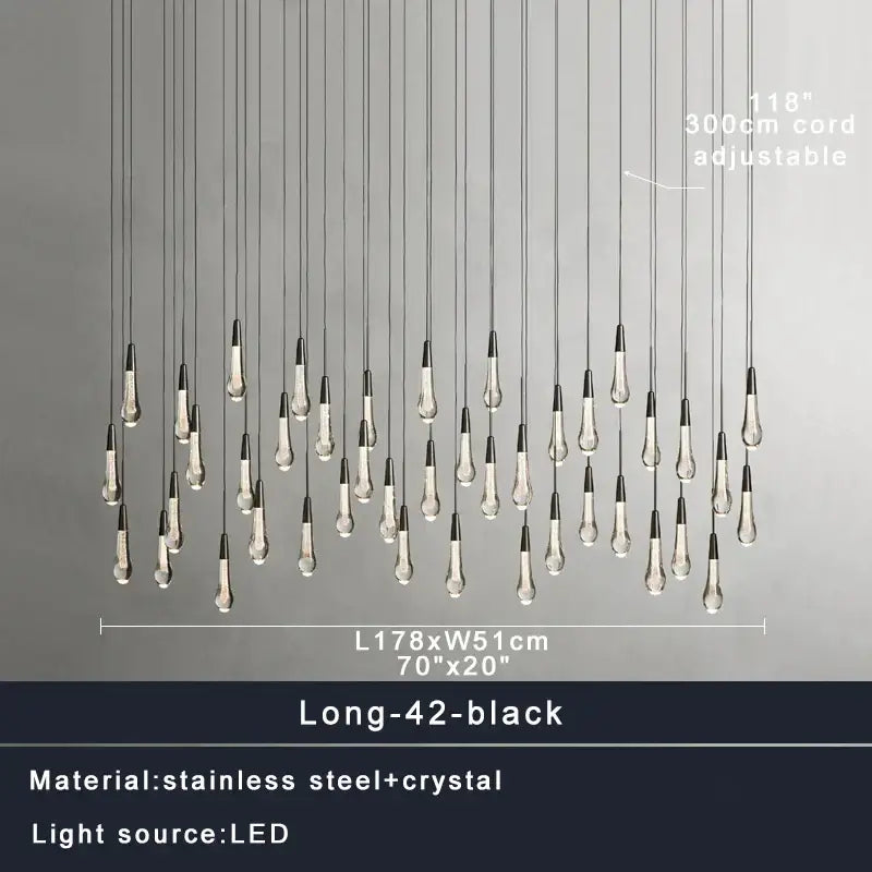 Modern brass crystal ceiling pendant light with black and clear crystal teardrop design and stainless steel accents by decorbites