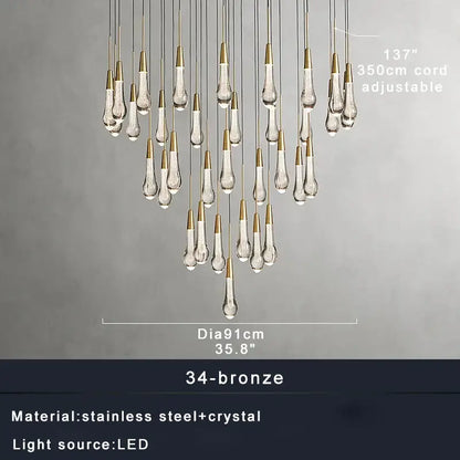 Modern brass crystal ceiling pendant light with teardrop-shaped crystal pendants and bronze-finished cords for dining room decorbites brass crystal