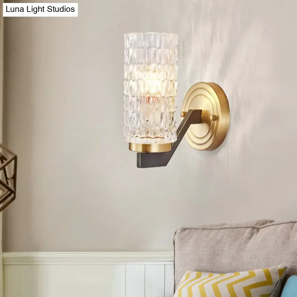 Modern brass crystal flush wall sconce with textured faceted glass and gold-toned metal bracket for bedroom wall lamp