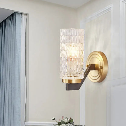 Modern brass crystal flush wall sconce with gold metal base and faceted glass in modern design wall lamp for bedroom