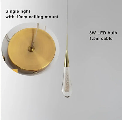 Modern brass crystal led chandelier with clear teardrop glass and embedded crystals for dining room decorbites crystal led