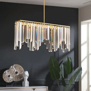 Modern brass crystal led island light with gold frame and cascading clear crystal prisms for dining room island light