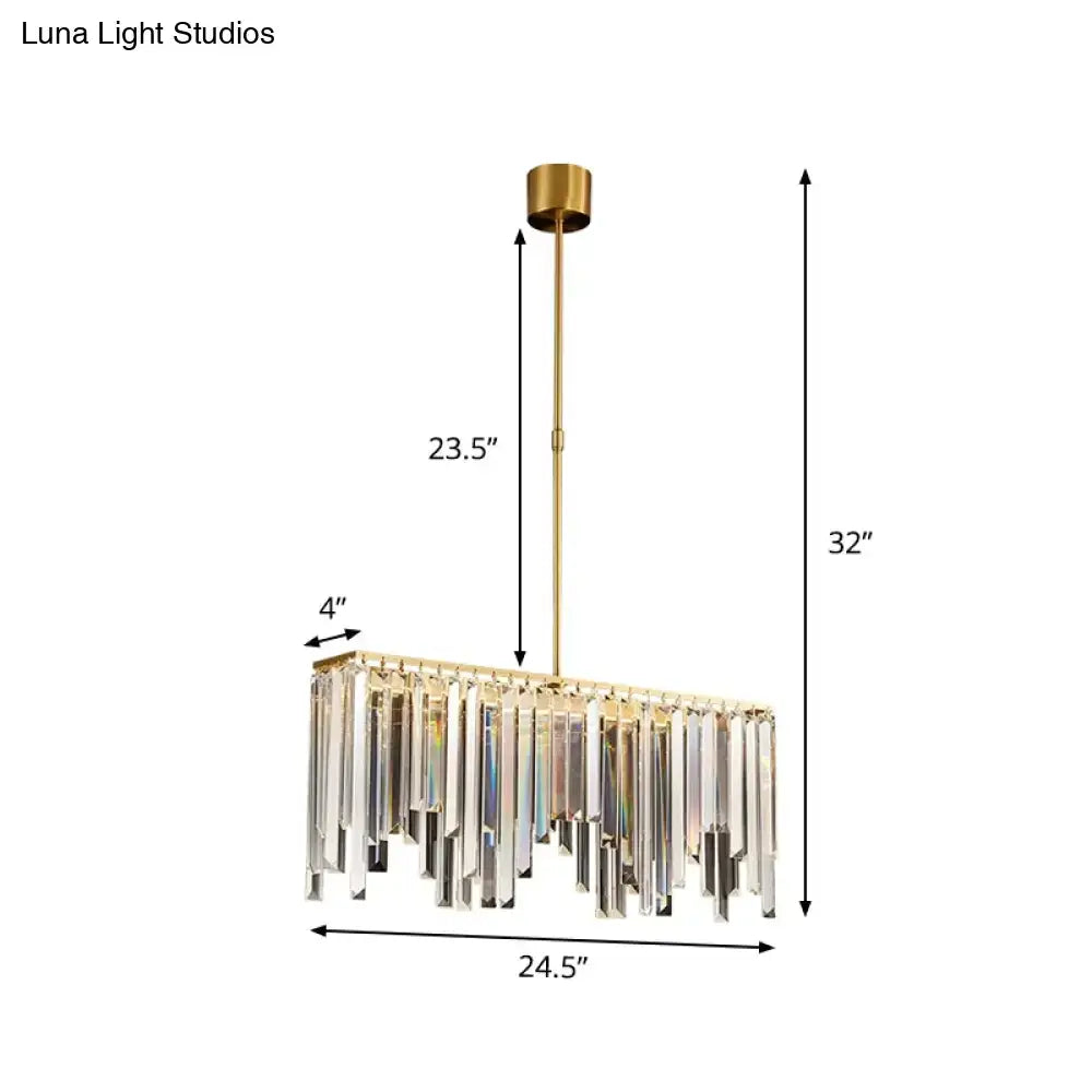 Modern brass crystal led island light with gold finish and cascading clear crystal prisms for dining room use