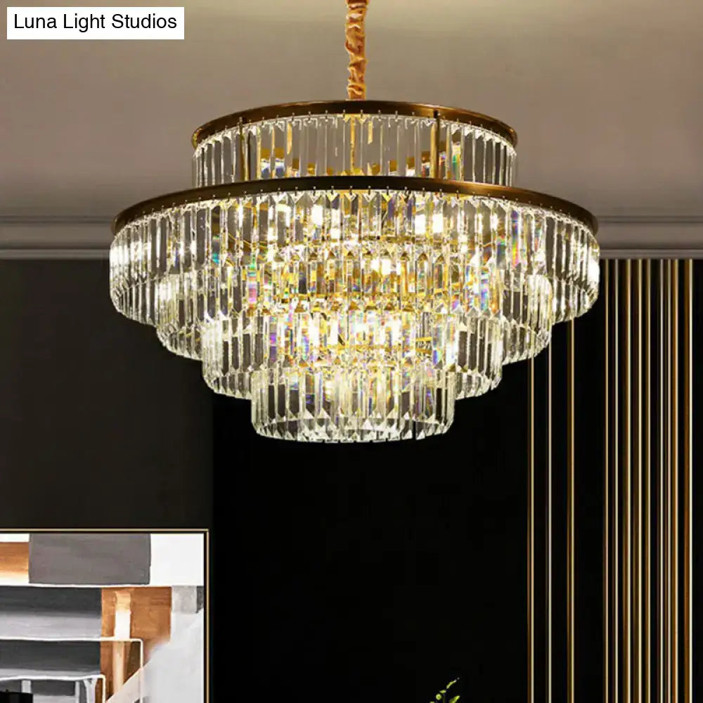 DecorBites™ modern crystal prism pendant light with gold-toned metal frame and cascading clear faceted crystals