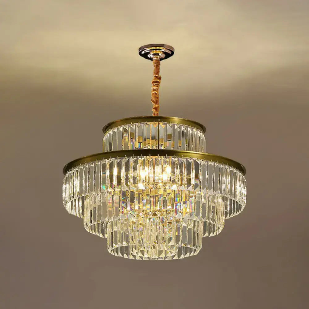 DecorBites™ modern crystal prism pendant light with brass finish and cascading clear glass prisms for living room