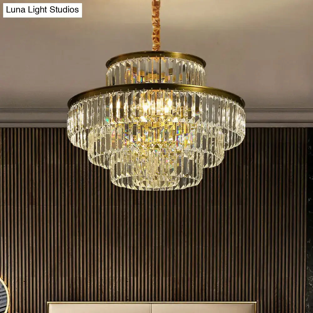 DecorBites™ modern crystal prism pendant light with gold-toned metal and cascading clear glass prisms for living room