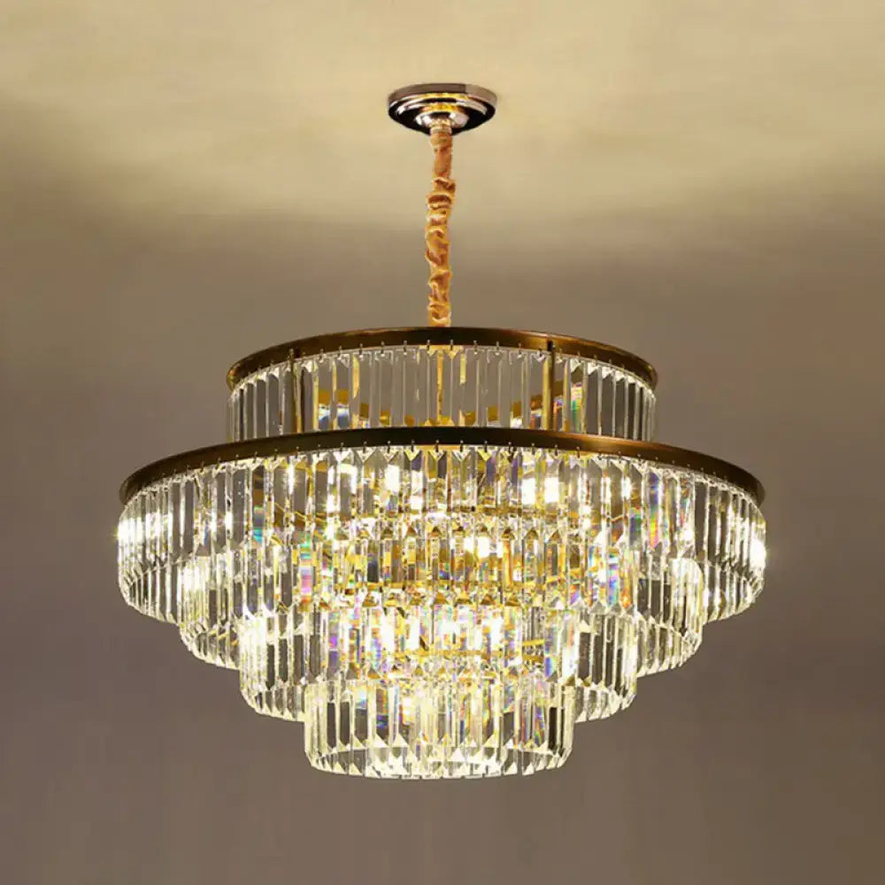 DecorBites™ modern crystal prism pendant light with gold frame and cascading clear crystals for living room use