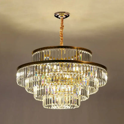 DecorBites™ modern crystal prism pendant light with gold frame and cascading clear crystals for living room use