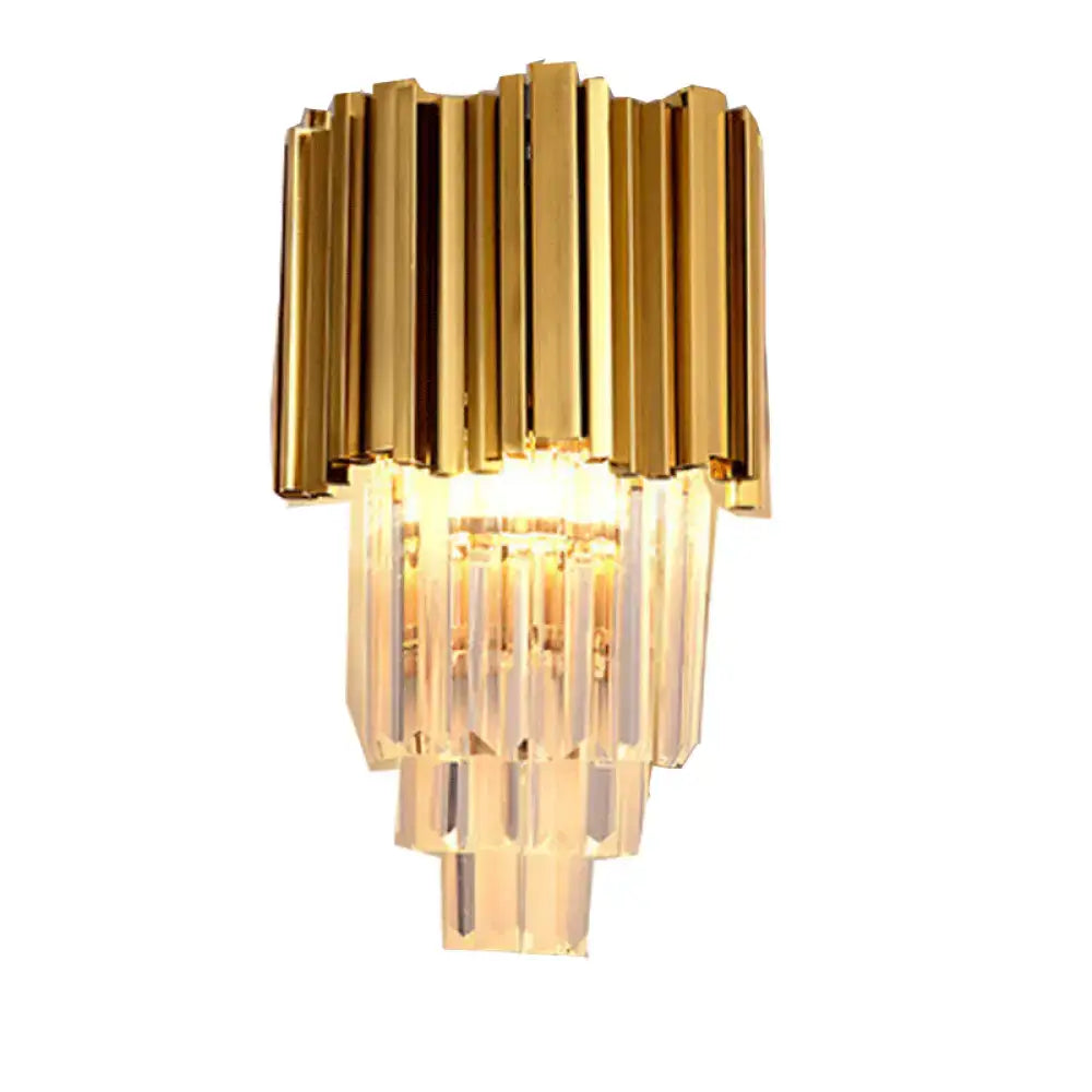 Modern brass wall lamp with gold-toned vertical bars and cascading crystal prisms direct wired electric for living room