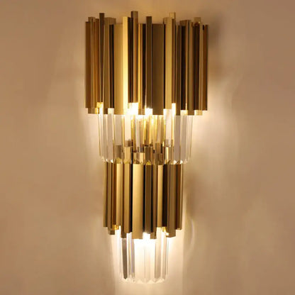 Modern brass crystal prisms wall lamp with gold-toned vertical bars direct wired electric for living room use