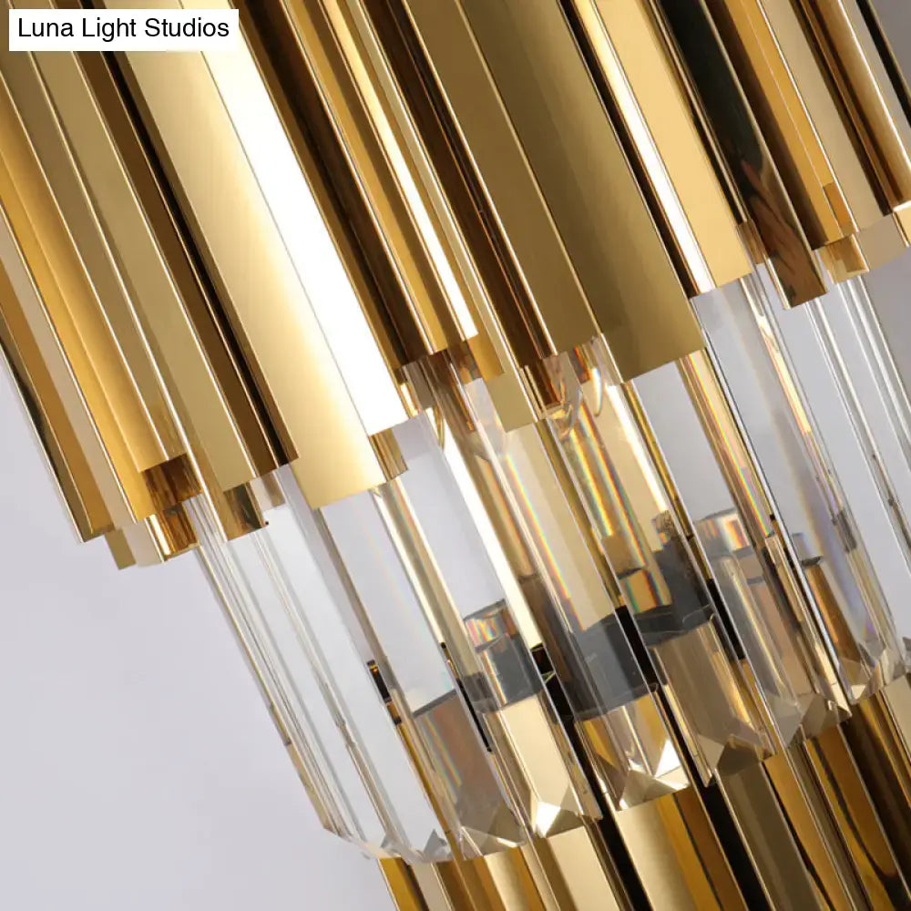 Modern brass wall lamp featuring direct wired electric installation with gold rods and clear crystal prisms