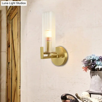 Modern brass crystal wall sconce featuring a gold-toned fixture height and 220v-240v clear ribbed glass light type