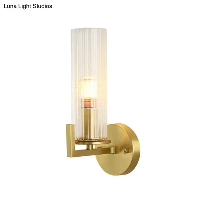 Modern brass crystal wall sconce with gold-toned fixture height and 220v-240v illuminated ribbed glass light type