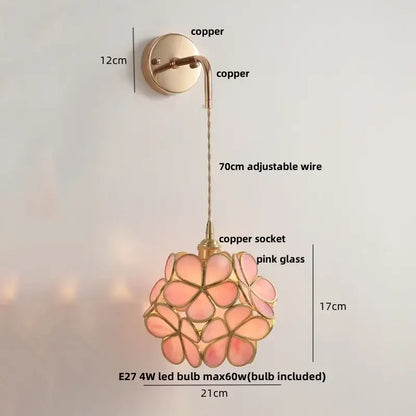 Modern brass cube led wall lights with a delicate pink glass flower pendant and copper accents for bedroom decorbites led wall use