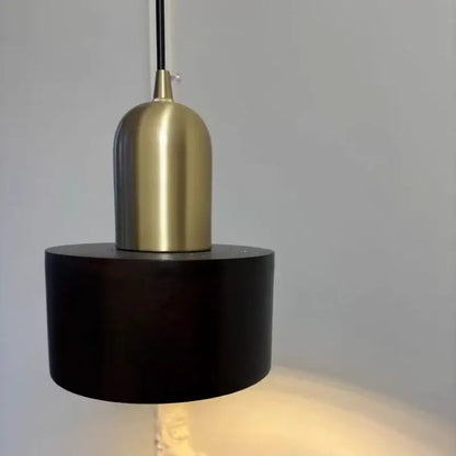 Modern brass and dark wood led wood pendant light with sleek brass dome and matte black base for dining room decorbites led wood pendant