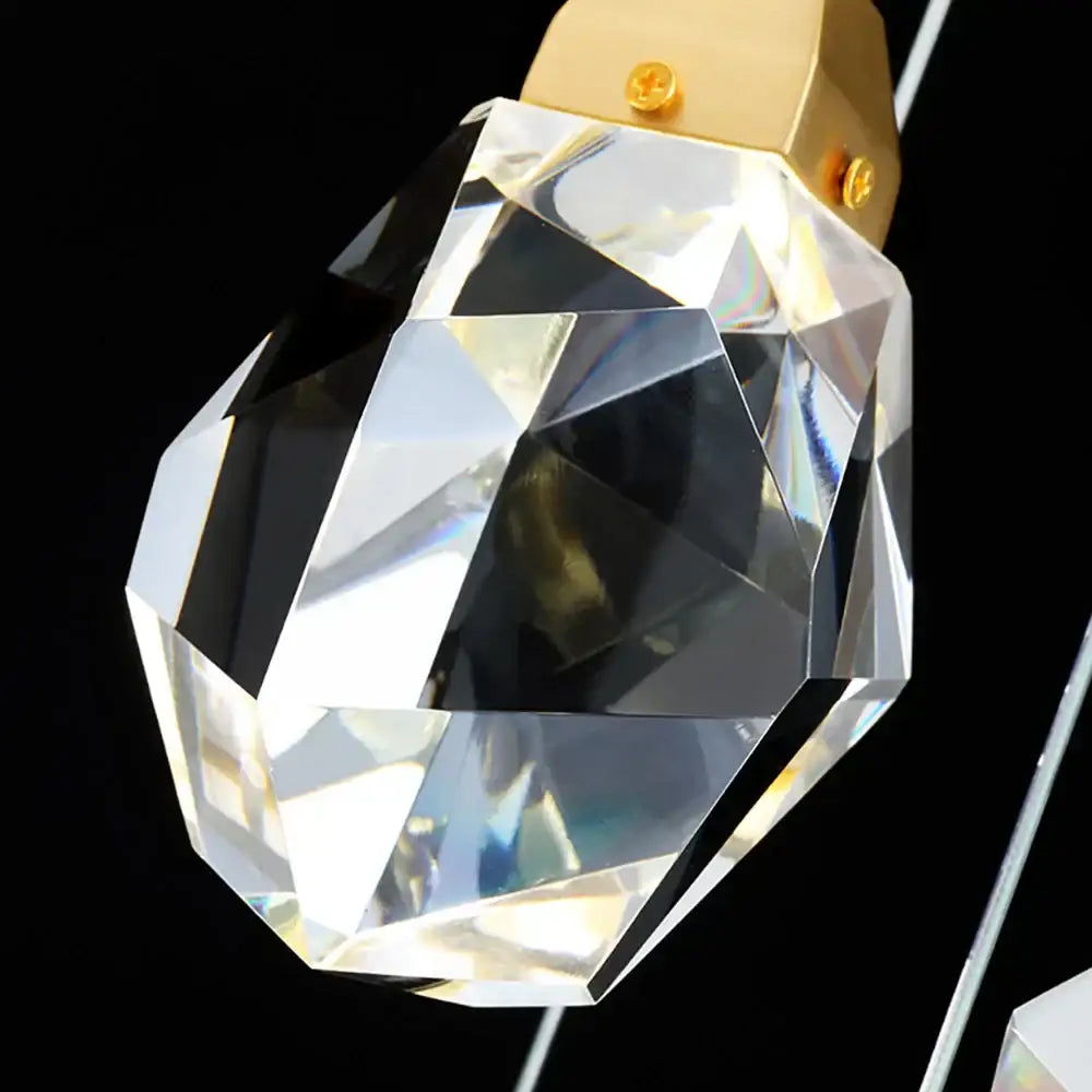 Modern brass decorbites crystal led chandelier pendant with faceted crystal and gold-toned metal cap for living room light