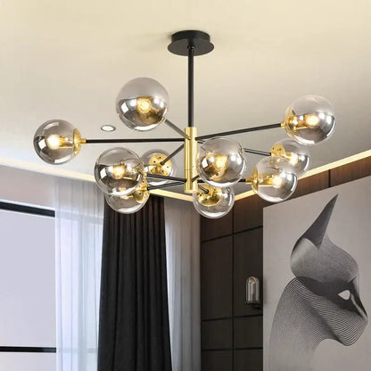 Modern brass decorbites glass ball led chandelier with multiple clear glass spheres on black and gold metal frame for kitchen lighting