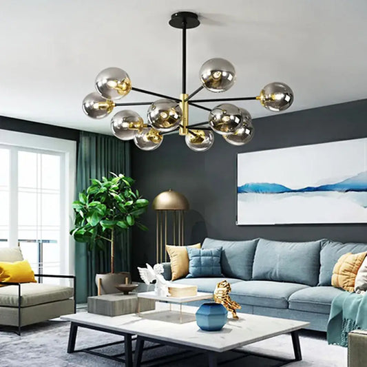 Modern brass decorbites glass ball led chandelier with multiple spherical globes and a brass frame for kitchen lighting