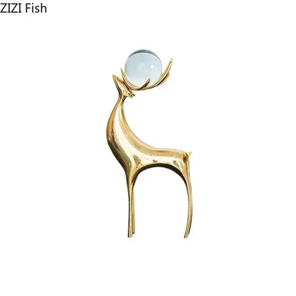 Modern brass deer statue desk ornament with polished golden finish and crystal sphere for living room decorbites brass deer