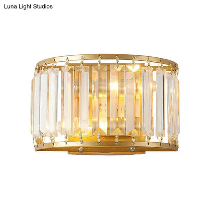 Modern brass drum shaped wall sconce with gold finish vertical crystal prisms and dangling clear crystals for e12 e14 bulb
