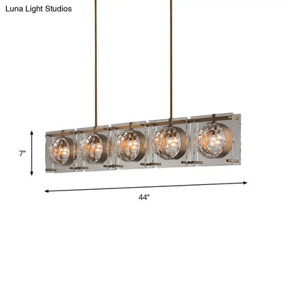 Modern brass pendant light with five faceted crystal spheres in brushed brass for e12 e14 bulbs