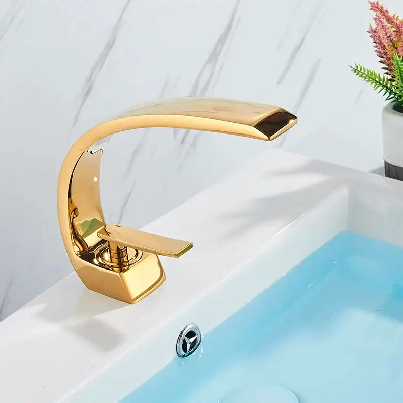 Modern brass faucet hot cold water mixer tap with sleek curved spout and rectangular handle decorbites brass faucet