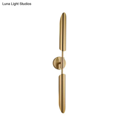 Modern brass finish led wall lamp with gold cylindrical arms and circular mount suitable for 220v-240v 110v-120v use