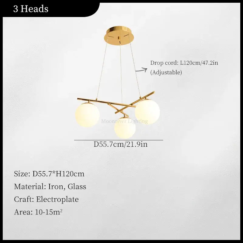 Modern brass french glass ball pendant light features a gold electroplated iron frame with three spherical shades decorbites french glass