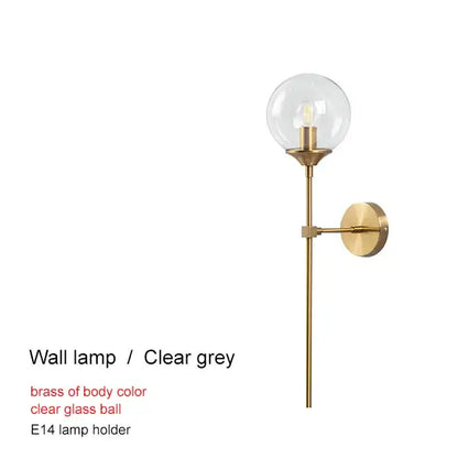 A sleek modern brass glass ball chandelier with clear globe and e14 bulb holder for living room decorbites brass glass