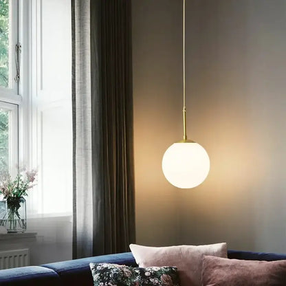 Minimalist modern brass glass ball led chandelier with frosted spherical glass shade for dining room pendant light decorbites glass ball