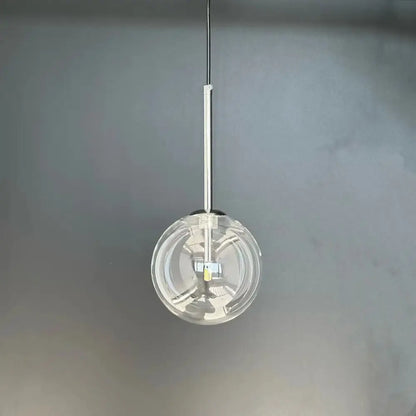 Modern brass glass ball led pendant lamp featuring a clear glass ball led with a sleek chrome-finished rod for decorbites glass ball lighting