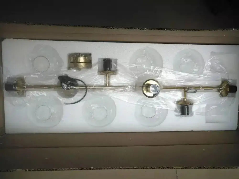 Modern brass glass ball metal pendant lights featuring five adjustable glass shades for kitchen bar decorbites glass ball lighting
