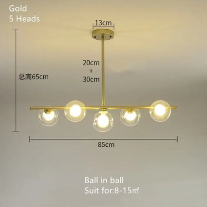 Modern brass glass ball pendant chandelier in gold with five spherical glass bulbs for dining room decorbites glass ball