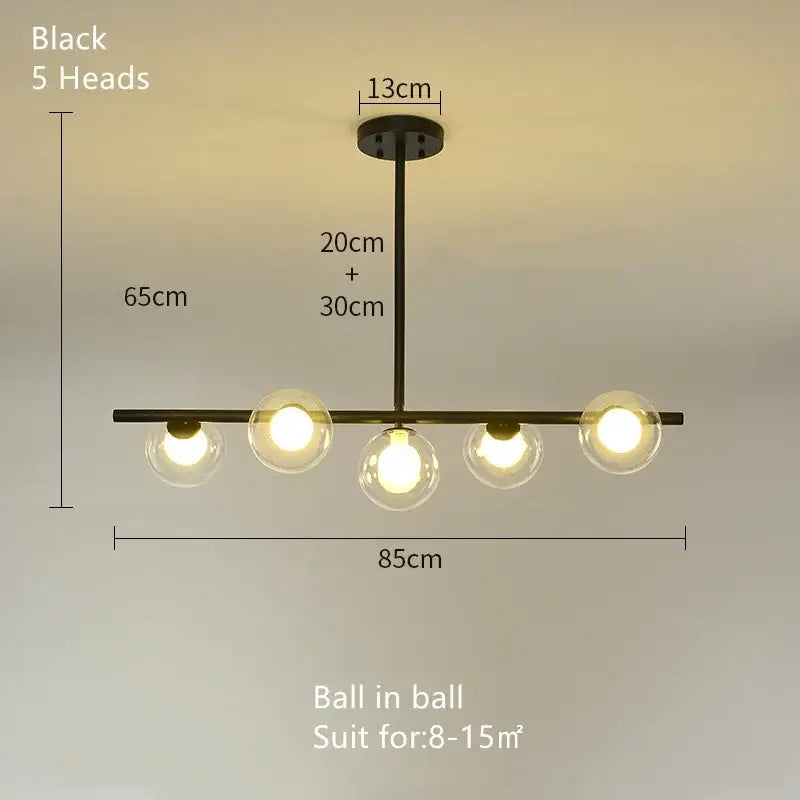 Black metal glass ball pendant chandelier with five clear glass globe bulbs for modern dining room decorbites glass ball light